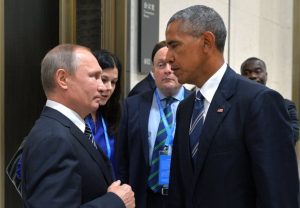 נשיא ארצות הברית ברק אובמה ונשיא רוסיה ולדימיר פוטין. תמונה: ALEXEI DRUZHININ