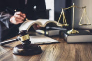 lawyer-judge-counselor-working-with-agreement-contract-courtroom_28283-730-68afb03b