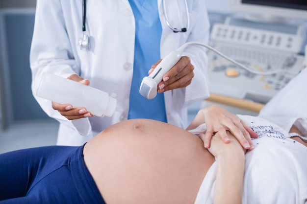 pregnant-woman-receiving-ultrasound-scan-stomach_107420-63777-7e363b5d